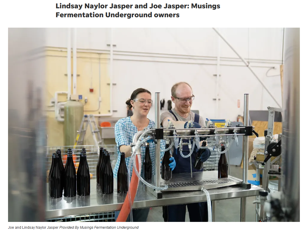 Joe Jasper and Lindsay Naylor featured as Delaware top "influencers" pictured here running the brewery bottling line.